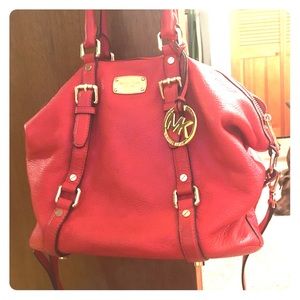 Orange/coral Authentic Michael Kors purse. Used.